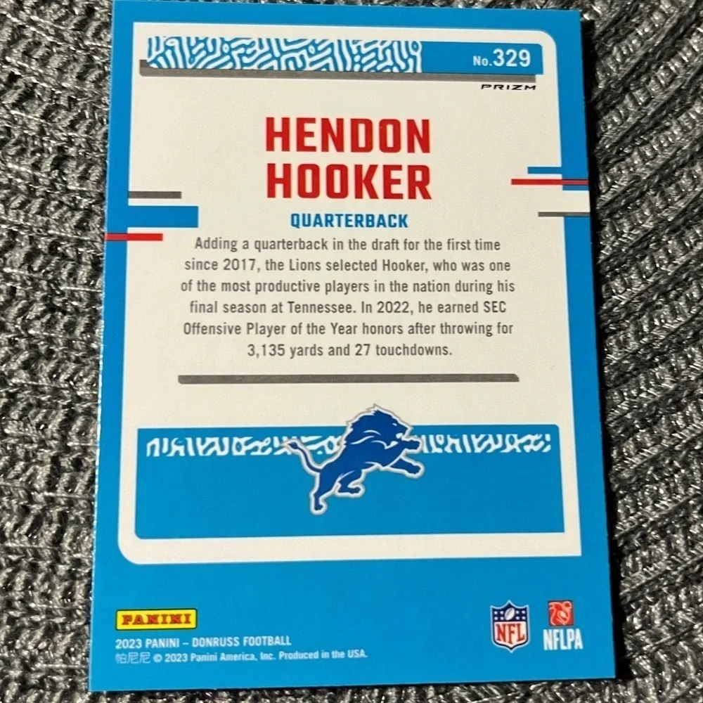 🏈 2023 Panini Donruss Hendon Hooker Optic Rated Rookie Red/Green Prizm #329